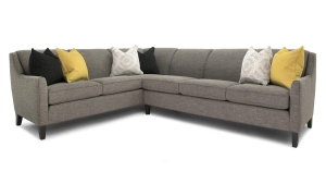 Measures 94" x 117" x 36"H and is available in a variety of fabrics, leathers, and leg finishes. Also available as a sofa, mid-size sofa, loveseat, chair, with matching ottoman. Sofa pricing starting at $2,559 in fabric and $3,649 in leather. Dark Gray Sectional