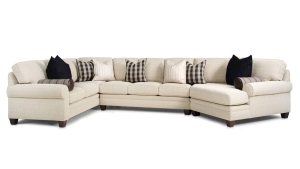 Measures 220" x 64" x 37"H and is available in a variety of fabrics, leathers, and leg finishes. Also available as a sofa, mid-size sofa, conversation sofa, loveseat, chair, with matching ottoman. Sectional shown starting at $7,549 in fabric and $10,649 in leather. Cream Sectional